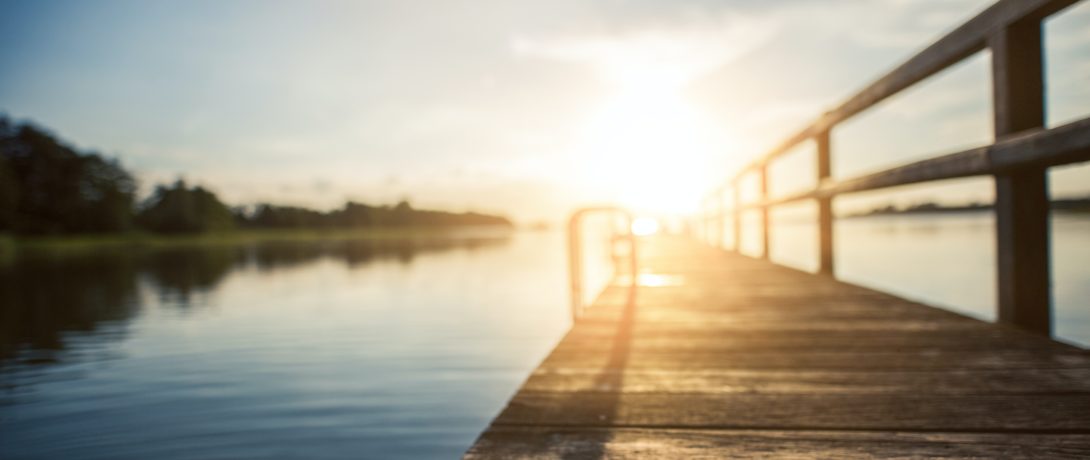 low-angle-photography-of-brown-wooden-dock-at-golden-house-205002